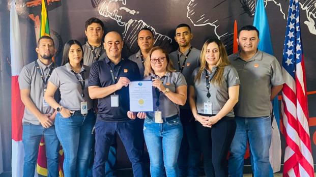 EFL Honduras staff members smiling with certification
