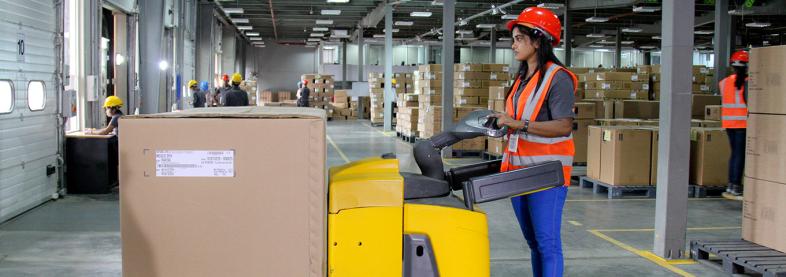 Woman driving loader