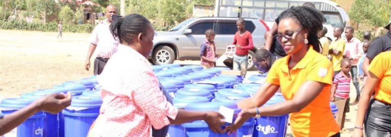 EFL staff passing out water