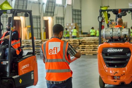 EFL employees working with loaders