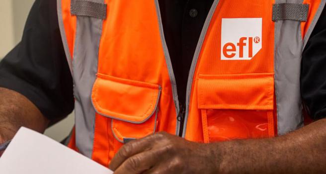 EFL Worker with orange vest