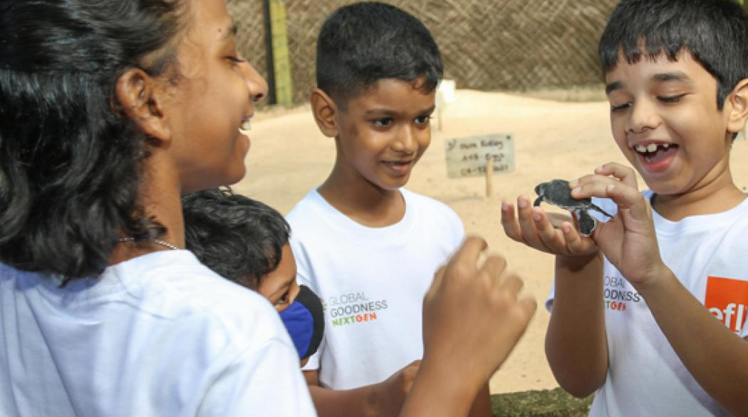 Kids with baby turtle